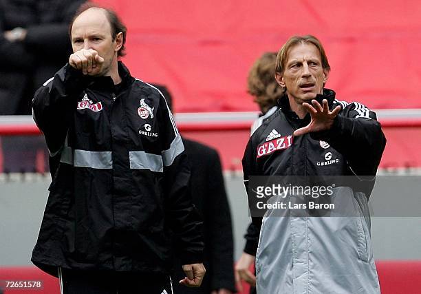 Assistant-coach Roland Koch and coach Christoph Daum gesture during the 1.FC Cologne training session on November 27, 2006 in Cologne, Germany.