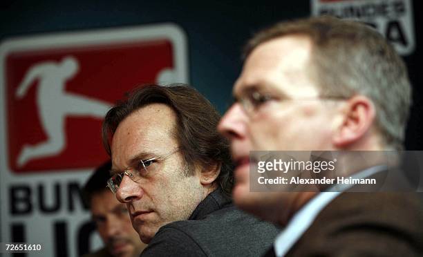Thomas Schneider and Holger Hieronymus of the DFL are seen during a press conference of the German Football League DFL and the fan representative of...