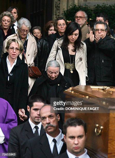 The widow of French actor Philippe Noiret, Monique Chaumette , and their daughter Frederique , follow the coffin out of the Sainte-Clotilde basilica,...