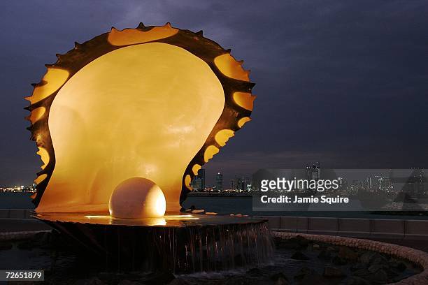 General view of a sculpture of a pearl in an oyster along the corniche area of downtown Doha November 27, 2006 in Doha, Qatar.