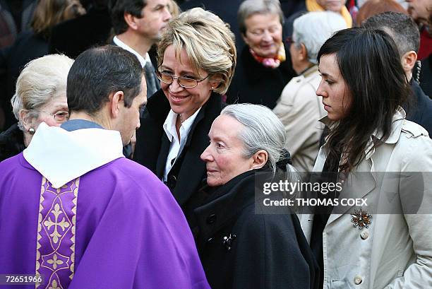 The widow of French actor Philippe Noiret, Monique Chaumette , and their daughter Frederique , leave Sainte-Clotilde basilica, 27 November 2006 in...