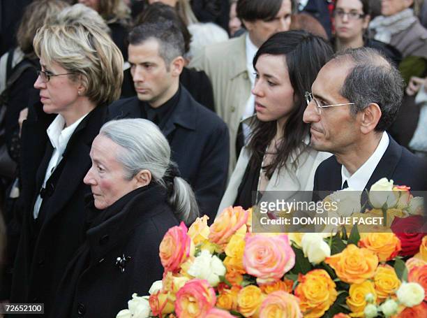 The widow of French actor Philippe Noiret, Monique Chaumette , and their daughter Frederique , leave Sainte-Clotilde basilica, 27 November 2006 in...