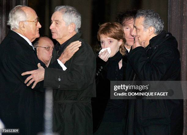 French historian Alain Decaux, journalisr Yvan Levai, an unidentified woman, singer and actor Alain Souchon, and actor Francis Perrin leave after the...