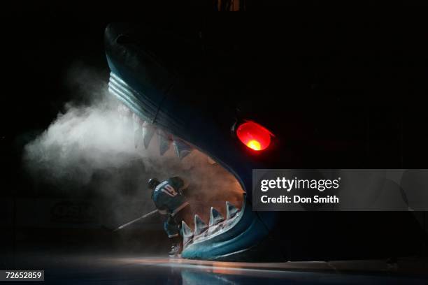 Joe Thornton of the San Jose Sharks skates through the Sharks head prior to a game against the Minnesota Wild on November 7, 2006 at the HP Pavilion...