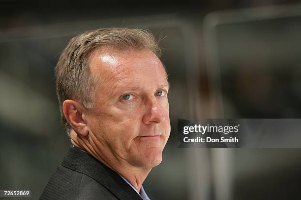 Head coach Ron Wilson of the San Jose Sharks follows warmups from the bench prior to a game against the Minnesota Wild on November 7, 2006 at the HP...