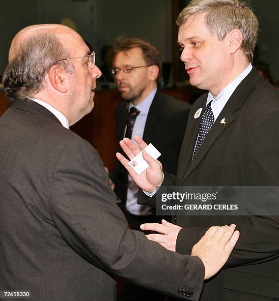 European Union monetary Affairs commissioner Joaquim Almunia chats with Czech Republic Finance minister Vlastimil Tlusly prior an ECOFIN meeting 28...