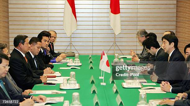 Japanese Prime Minister Shinzo Abe speaks to visiting Indonesian President Susilo Bambang Yudhoyono during their talks at Abe's official residence on...