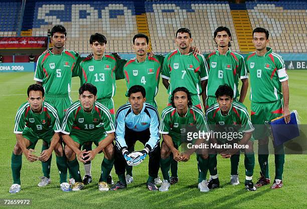 Players from Bangladesh pose for a picture before the 15th Asian Games Doha 2006 Men's Group B 2nd Round football match between Korea and Bangladesh...