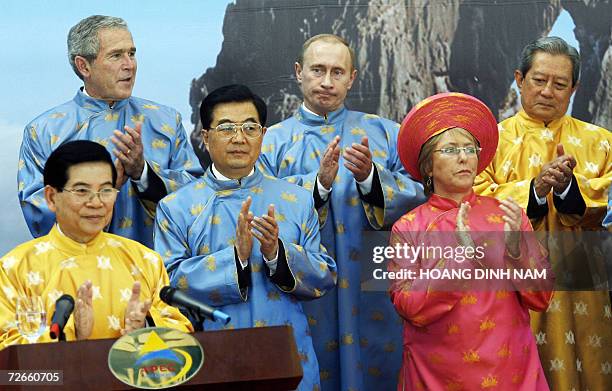 President George W. Bush , Chinese President Hu Jintao , Russian President Vladimir Putin , Chile President Michelle Bachelet and Thailand's...