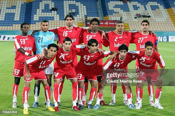 Players from Bahrain pose for a picture before the 15th Asian Games Doha 2006 Men's Group B 2nd Round football match between Bahrain and Vietnam at...