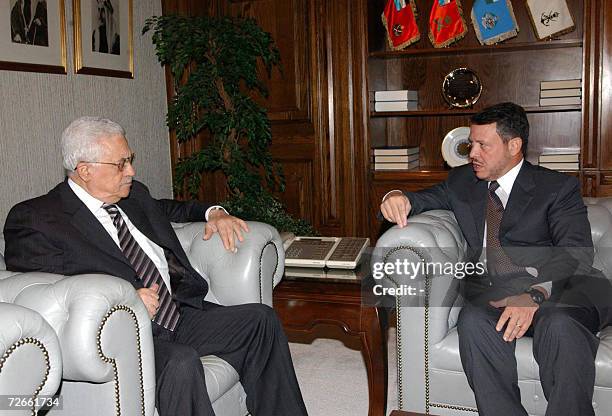 Houndout picture released by the Palestinian Authority Press Office shows Jordanian King Abdullah II during a meeting with Palestinian leader Mahmud...