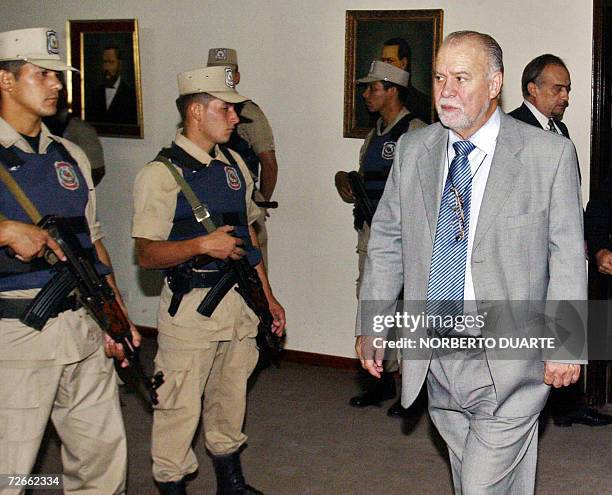 Former Paraguayan President Raul Cubas arrives to the court before the announcement by the Justice of the sentence to 15 peoples accused of...