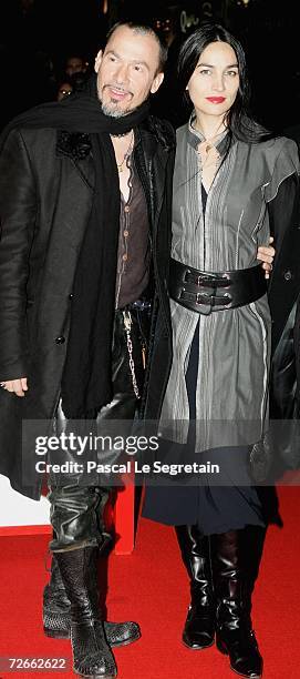 Singer Florent Pagny poses with his wife Azucena during the official Christmas lighting ceremony at The Champs Elysees November 28, 2006 in Paris,...