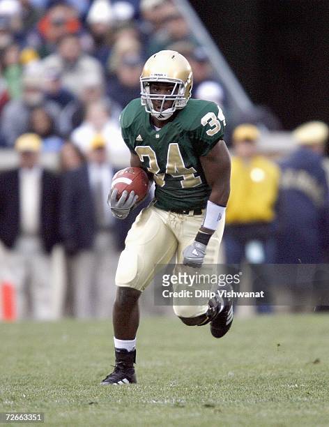 James Aldridge of the Notre Dame Fighting Irish carries the ball against the Army Black Knights at Notre Dame Stadium on November 18, 2006 in South...