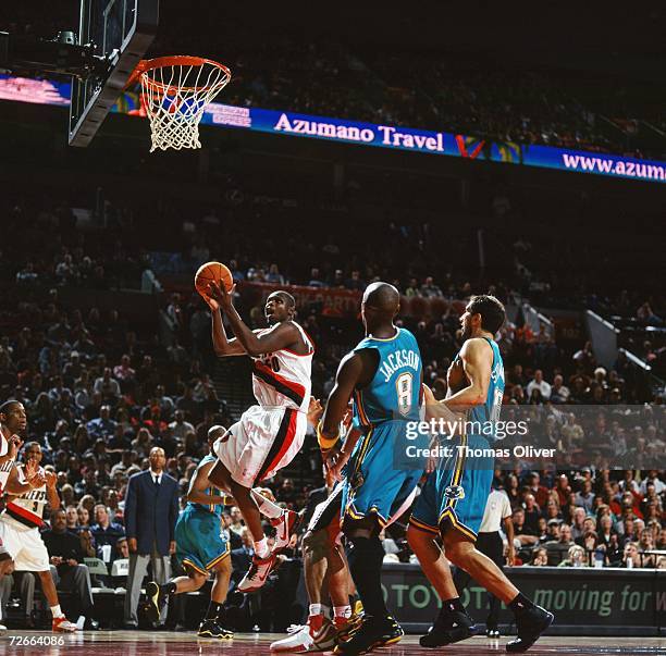 Zach Randolph of the Portland Trail Blazers takes the ball to the basket during a game against the New Orleans/Oklahoma City Hornets at The Rose...