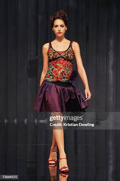 Model walks the catwalk wearing an outfit by designer Albert King on the first day of Malaysian-International Fashion Week at the Kuala Lumpur...