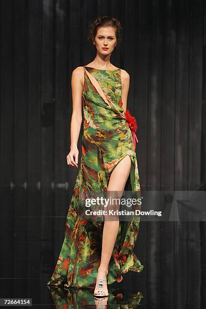 Model walks the catwalk wearing an outfit by designer Albert King on the first day of Malaysian-International Fashion Week at the Kuala Lumpur...