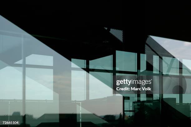 modern foyer with reflection of cityscape in window - specchio foto e immagini stock