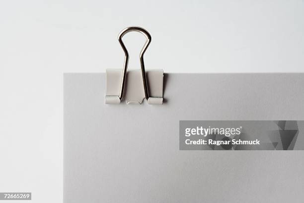 binder clip on document - clip stock pictures, royalty-free photos & images