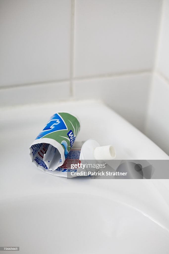 Rolled up tube of toothpaste