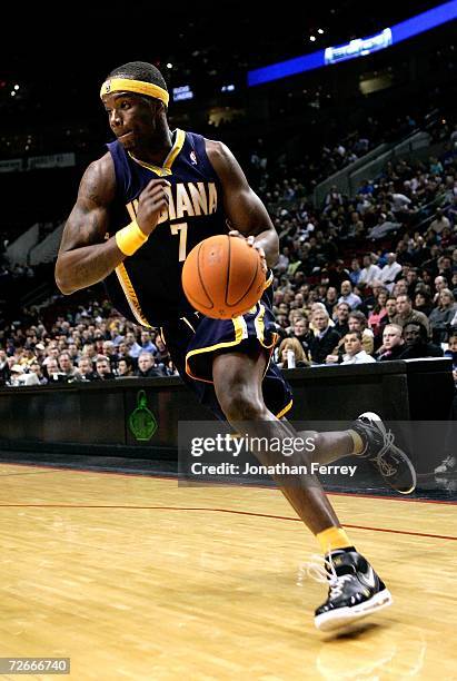 Jermaine O'Neal of the Indiana Pacers dribbles the ball against the Portland Trail Blazers on November 28, 2006 at the Rose Garden in Portland,...