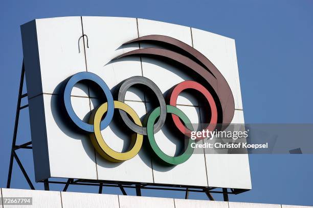 The Olympic rings logo is shown on a sign on a rooftop prior to the start of the 15th Asian Games Doha 2006 November 29, 2006 in Doha, Qatar. The...