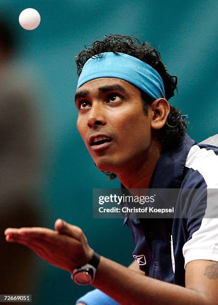 Sharath Kamal Achanta of India looks to serve during the Men's Team Round One at the 15th Asian Games Doha 2006 at Al-Arabi Indoor Hall November 29,...