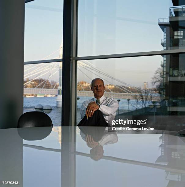 English architect Norman Foster at the Foster and Partners studio on Riverside Three of the River Thames in London, circa 1995. Albert Bridge is...