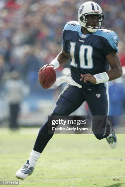 Vince Young of the Tennessee Titans runs against the Baltimore Ravens on November 12, 2006 at LP Field in Nashville, Tennessee. The Ravens won 27-26.