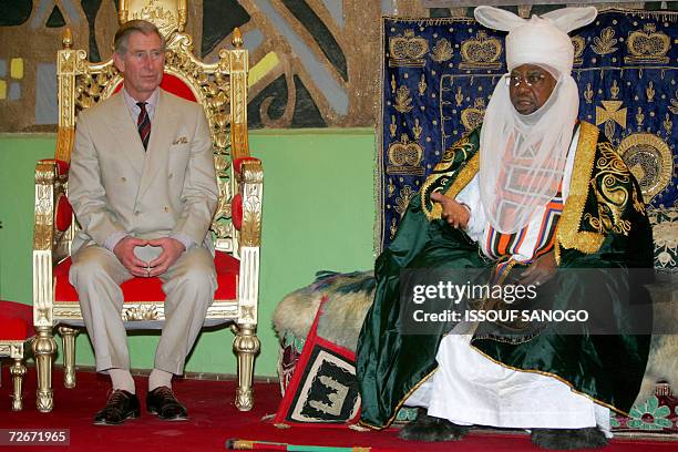 Britain?s Prince Charles listens to the Emir of Kano, Ado Bayero, in Kano, 29 November 2006. Britain?s Prince Charles received a warm welcome in the...