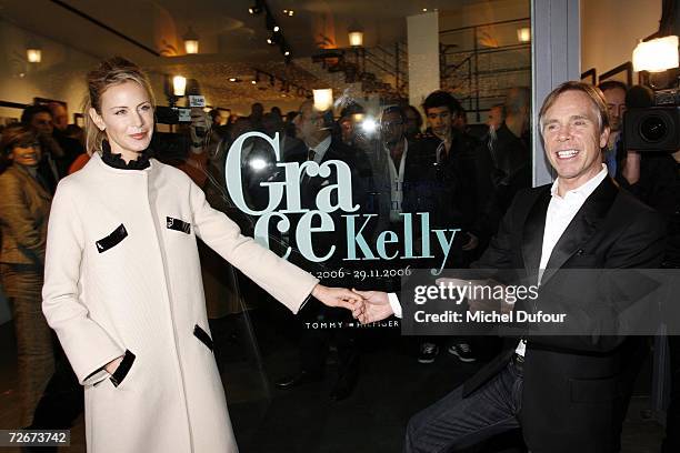 Designer Tommy Hilfiger and Dee Ocleppo attend an auction of photographic prints of actress Grace Kelly with proceeds benefiting the Princess Grace...