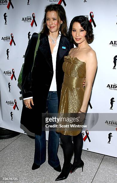 Actresses Tea Leoni and Lucy Liu arrive for a screening of "3 Needles" during the opening of The New York Aids Film Festival held at the United...