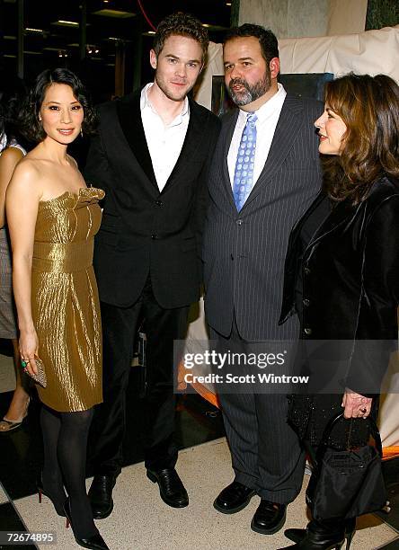 Actress Lucy Liu, actor Shawn Ashmore, director Thom Fitzgerald and actress Stockard Channing pose for a photo during a cocktail party before a...