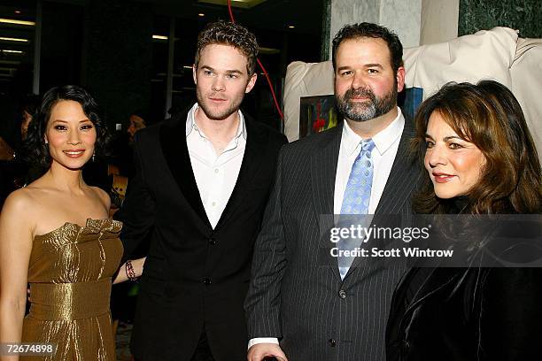 Actress Lucy Liu, actor Shawn Ashmore, director Thom Fitzgerald and actress Stockard Channing pose for a photo during a cocktail party before a...