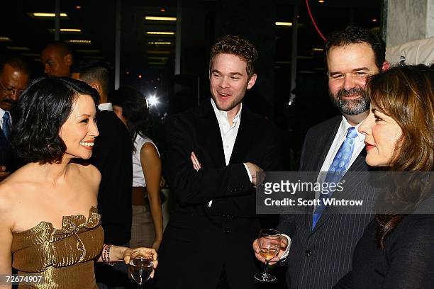 Actress Lucy Liu, actor Shawn Ashmore, director Thom Fitzgerald and actress Stockard Channing talk during a cocktail party before a screening of "3...