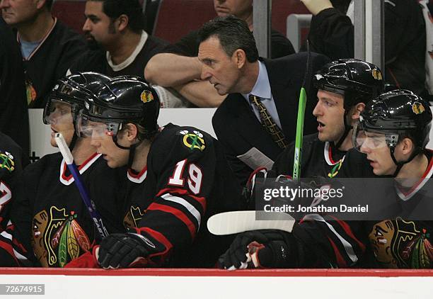 Head coach Denis Savard of the Chicago Blackhawks coaches against the Dallas Stars November 29, 2006 at the United Center in Chicago, Illinois