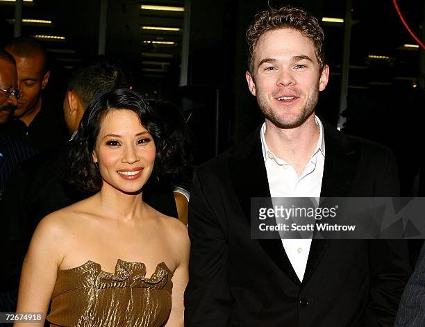 Actors Lucy Liu and Shawn Ashmore pose for a photo during for a photo during a cocktail party before a screening of "3 Needles" during the opening of...