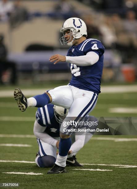 Place kicker Adam Vinatieri of the Indianapolis Colts follows through on a kick attempt against the Philadelphia Eagles November 26, 2006 at the RCA...