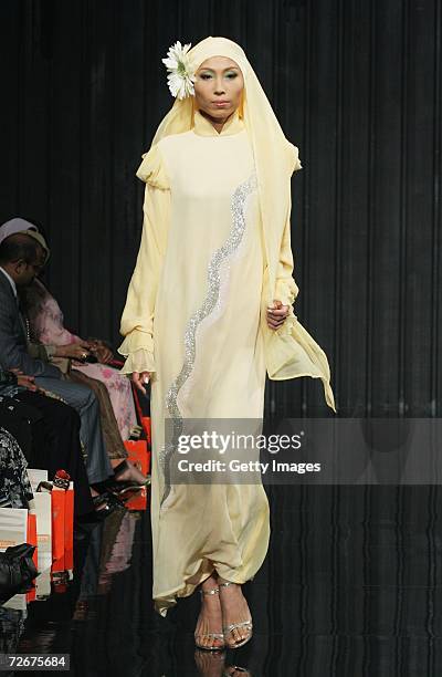 Model wears Kapas Couture at the Islamic Fashion Festival on the third day of Malaysian-International Fashion Week at the Kuala Lumpur Convention...