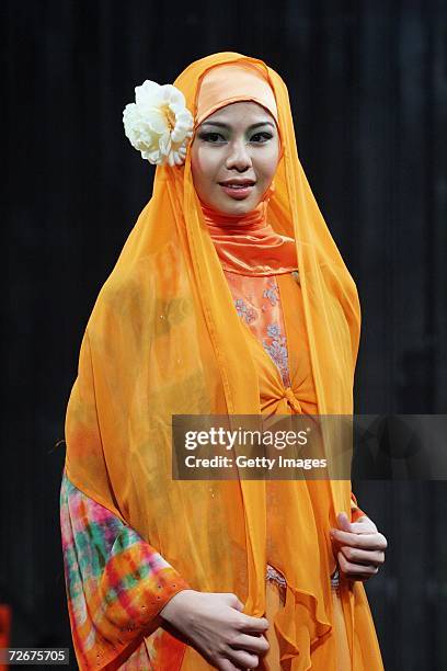 Model wears Kapas Couture at the Islamic Fashion Festival on the third day of Malaysian-International Fashion Week at the Kuala Lumpur Convention...