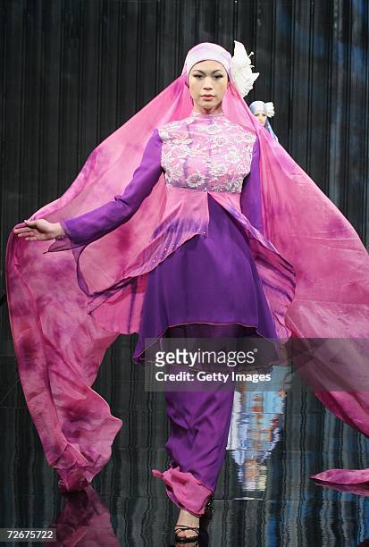 Model wears Kapas Couture at the Islamic Fashion Festival on the third day of Malaysian-International Fashion Week at the Kuala Lumpur Convention...