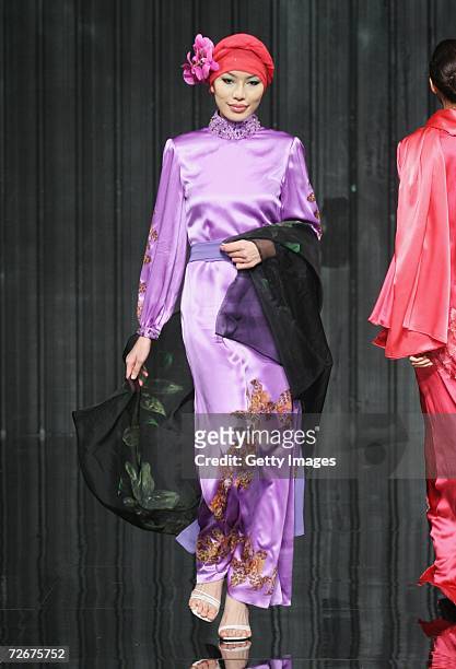 Model wears Melvin Lam at the Islamic Fashion Festival on the third day of Malaysian-International Fashion Week at the Kuala Lumpur Convention Centre...