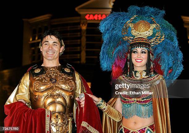 Caesar and Cleopatra characters attend the lighting ceremony for a Christmas tree in front of Caesars Palace November 29, 2006 in Las Vegas, Nevada.