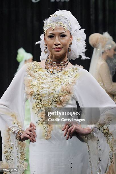 Model wears Radzuan Radziwill at the Islamic Fashion Festival on the third day of Malaysian-International Fashion Week at the Kuala Lumpur Convention...