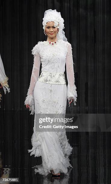 Model wears Radzuan Radziwill at the Islamic Fashion Festival on the third day of Malaysian-International Fashion Week at the Kuala Lumpur Convention...