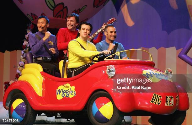 The Wiggles children's entertainers Jeff Fatt, Murray Cook, Sam Moran and Anthony Field perform on stage after holding a press conference to announce...