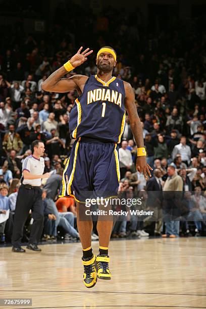 Stephen Jackson of the Indiana Pacers jumps and celebrates a win against the Golden State Warriors on November 29, 2006 at Oracle Arena in Oakland,...