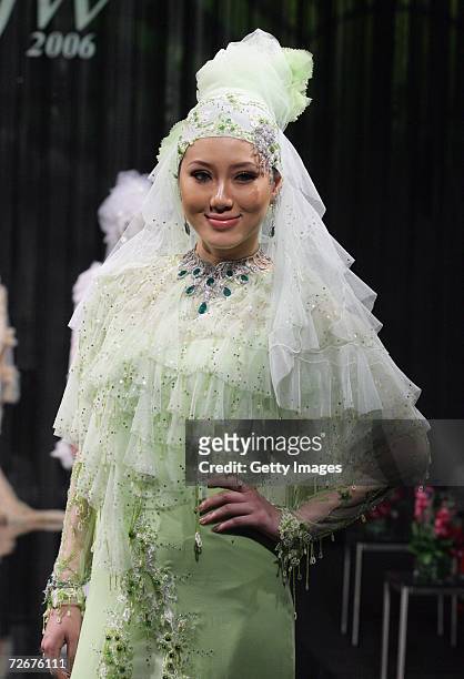 Model wears Radzuan Radziwill at the Islamic Fashion Festival on the third day of Malaysian-International Fashion Week at the Kuala Lumpur Convention...