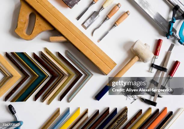 picture frame tools on white table - multiple picture frames stock pictures, royalty-free photos & images
