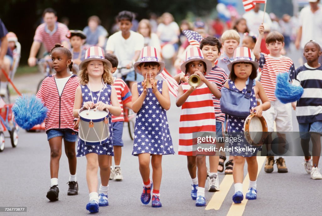 Children marching in 4th of July parade